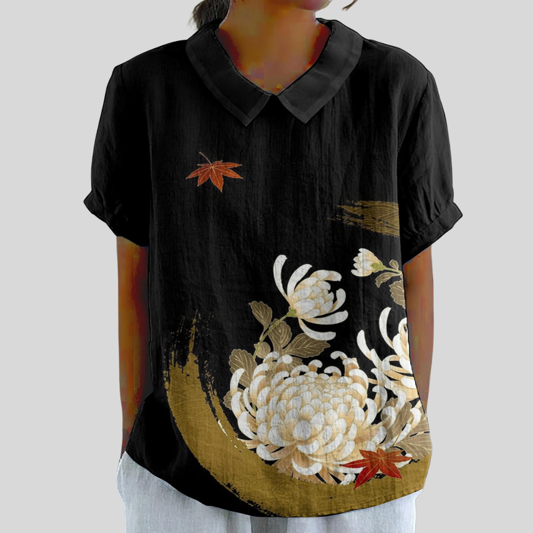 Madeleine | Blusa negra de elegancia floral