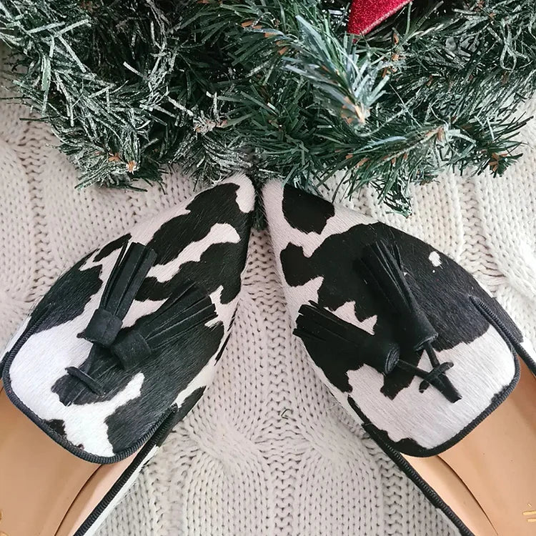 Gwendolyn | Mocasines con estampado de vaca y flecos
