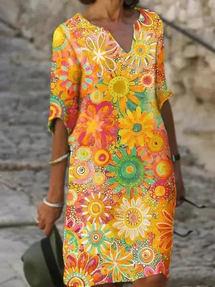 nira | Vestido midi floral brillante