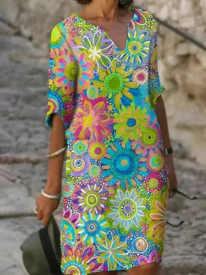 nira | Vestido midi floral brillante