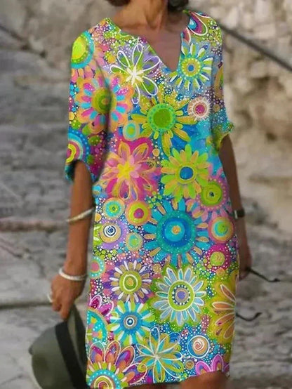 nira | Vestido midi floral brillante